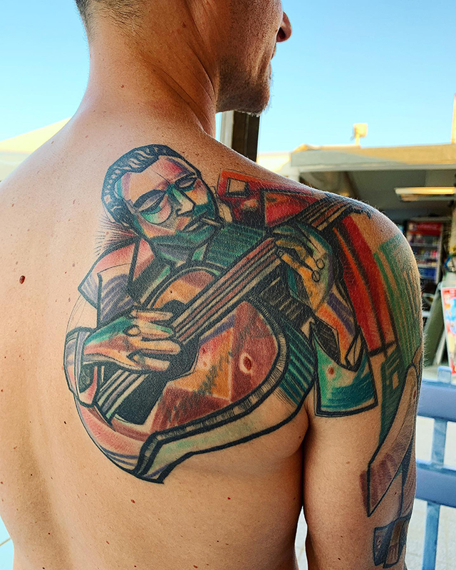 Tatouage / tatoo Django Reinhardt en couleur adapté de la photo de W. Gottlieb de 1946